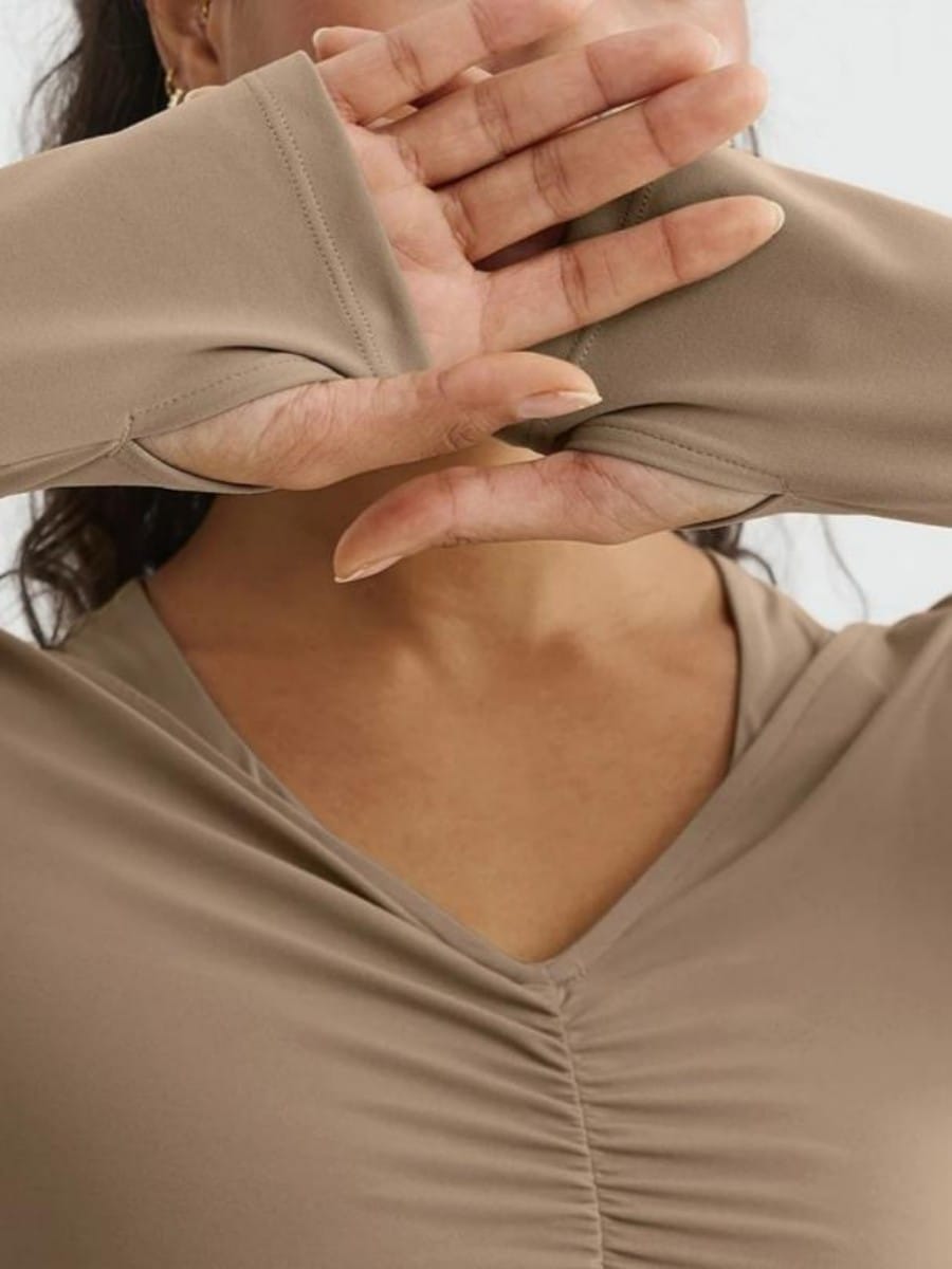 Camel long sleeve yoga top thumbhole detail