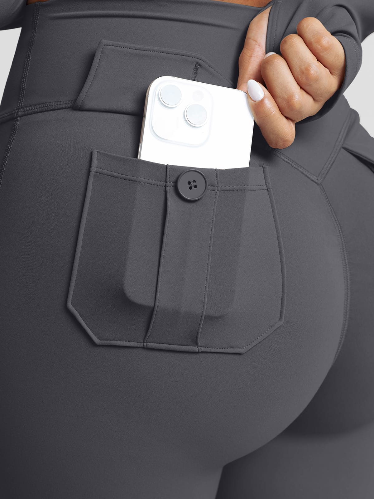 Dark gray cargo leggings with functional pockets
