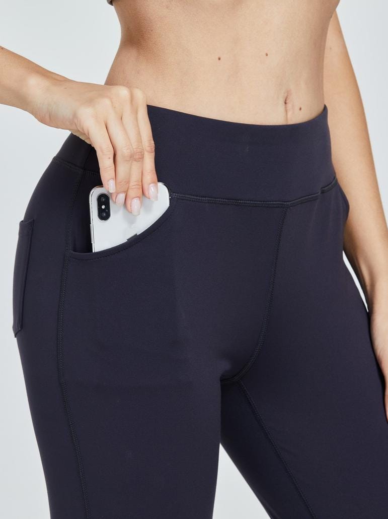 Dark blue high waisted flared yoga pants front view