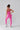 Blush Pink seamless activewear romper by Vractive Wholesale showing back design and fit