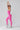 Side profile of Vractive Blush Pink high stretch yoga jumpsuit figure-flattering silhouette