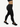 Side view of black Vractive yoga pants in active movement, wholesale yoga leggings
