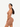 Side back view of brown Vractive seamless biker shorts set, eco-friendly V neck sportswear
