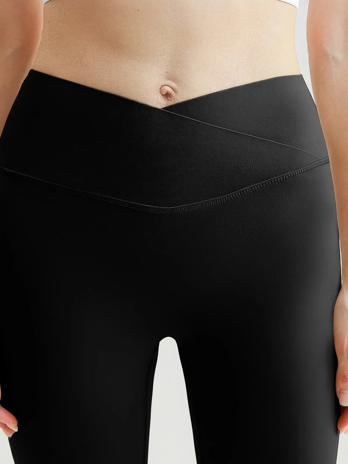 Wholesale Cross Waist Butt Lifting Flare Leggings with Hidden Pocket