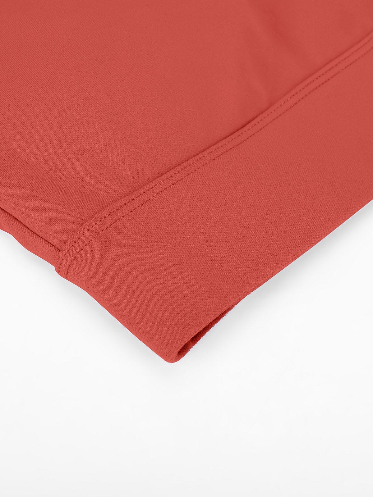 Close-up of breathable Mineral Red fabric on Vractive adjustable sports bra