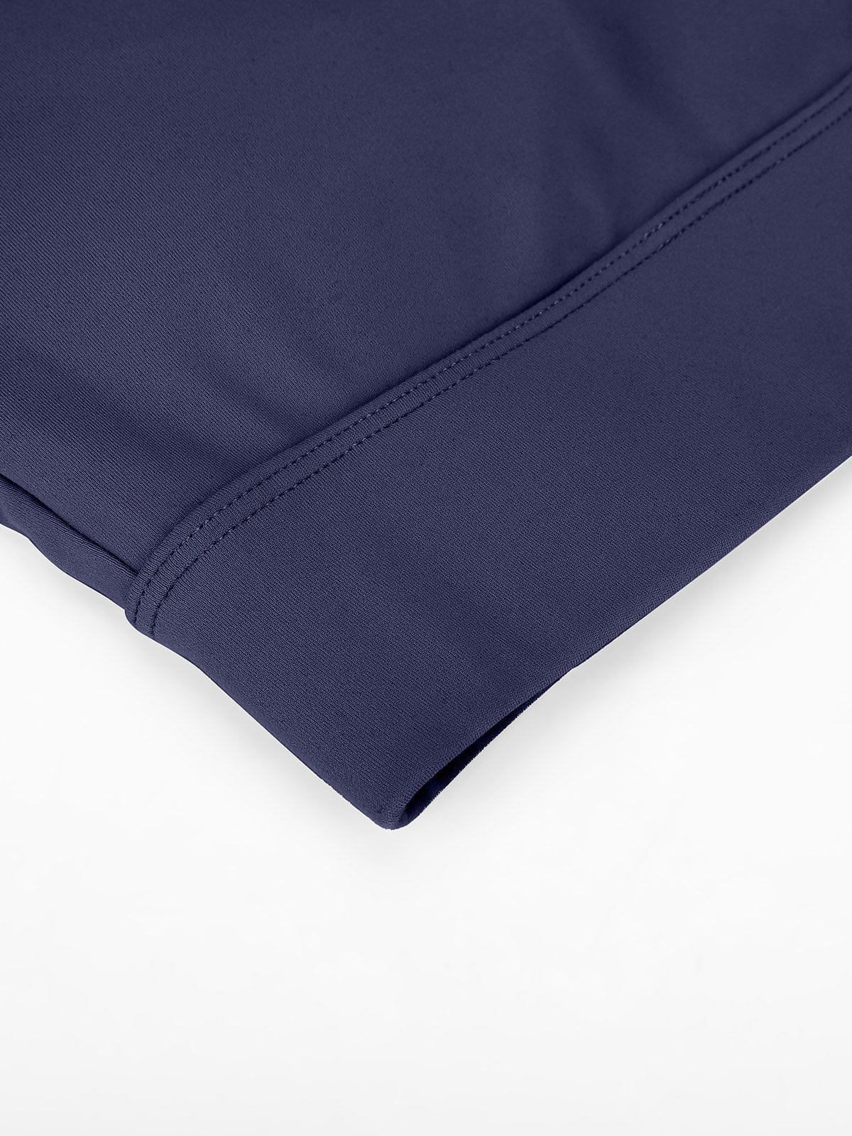 Macro view of the breathable Navy Blue performance fabric on Vractive bra