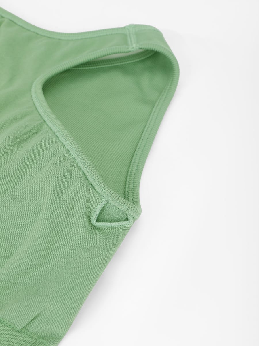 Green seamless jumpsuit removable padding detail