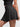 Side view of black Vractive ruffle hem skirt, wholesale A line sports skirt with built in shorts
