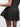Side view of black Vractive ruffle hem skirt, wholesale A line sports skirt with built in shorts
