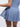 Back view of blue Vractive ruffle hem skirt, wholesale sports skirt with built in shorts
