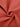 Detailed view of the premium Mineral Red fabric fold showing the wrinkle-resistant quality of Vractive yoga bras