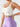 Model wearing Vractive Off White wide strap yoga bra side view