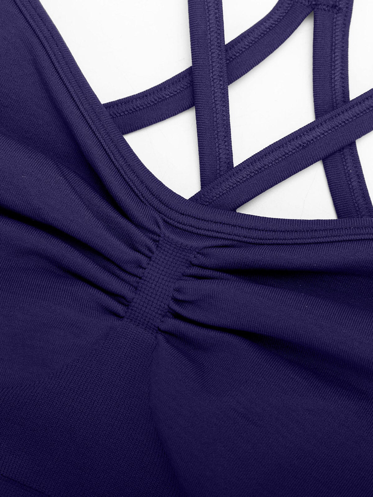 Close-up of four-way stretch sustainable fabric on Dark Blue Vractive yoga bra