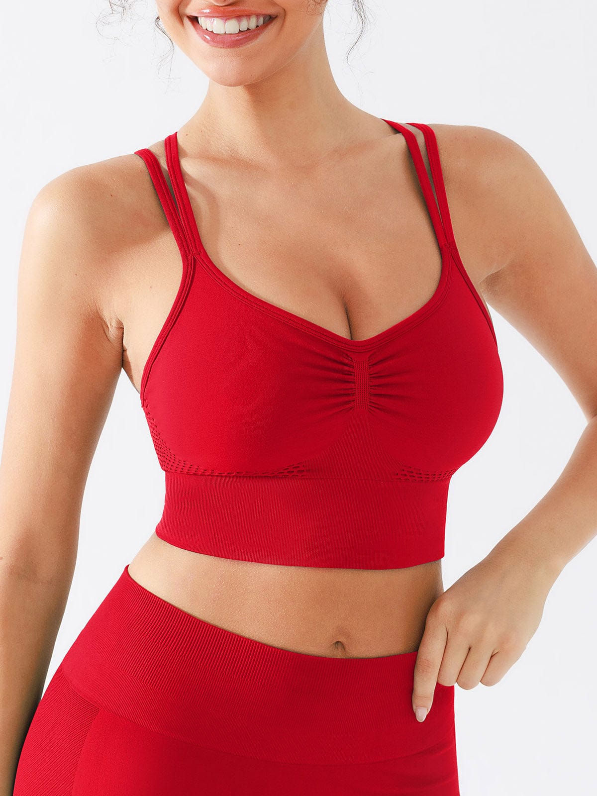 Side view of Chili Red four-way stretch sports bra from Vractive