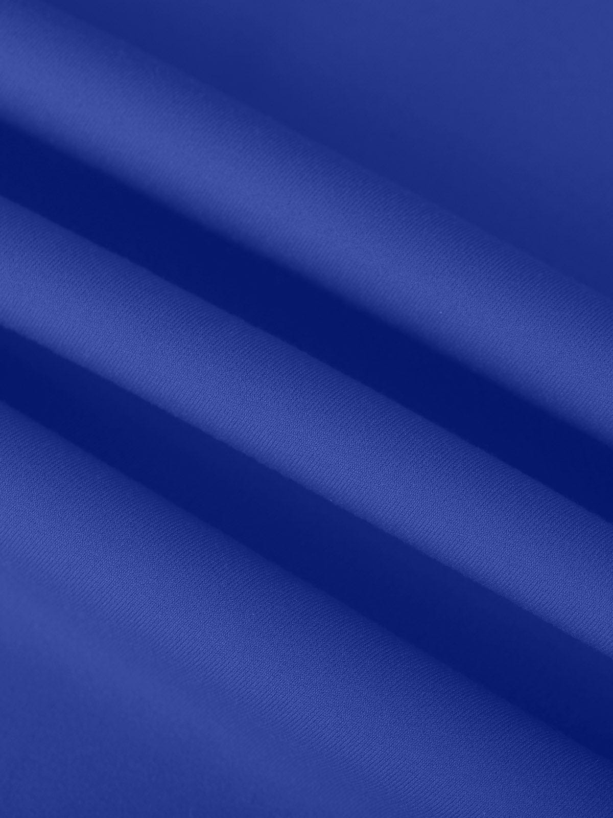Macro texture of the breathable Royal Blue performance fabric layer on Vractive tennis dress