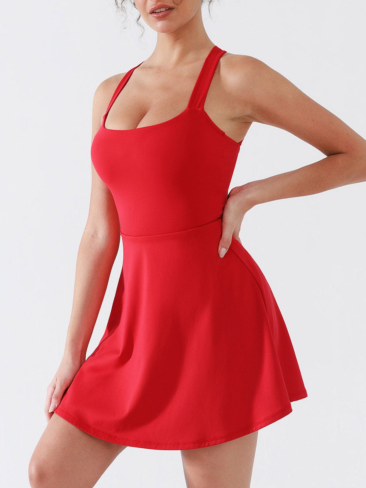 Side profile of Chili Red Vractive A-line tennis dress with functional fit