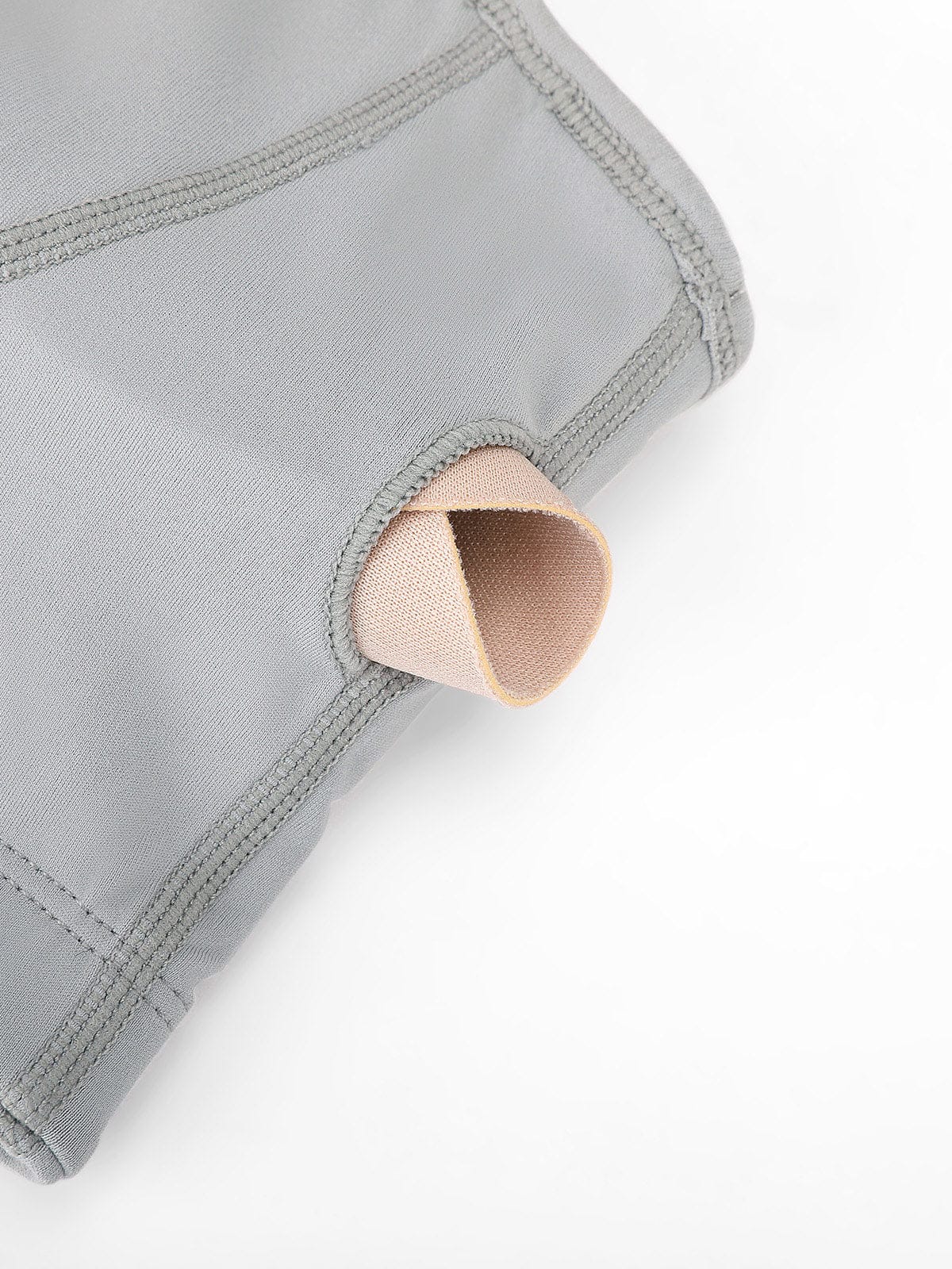 Lead Gray Vractive zip-front bra displaying removable padding feature for custom support