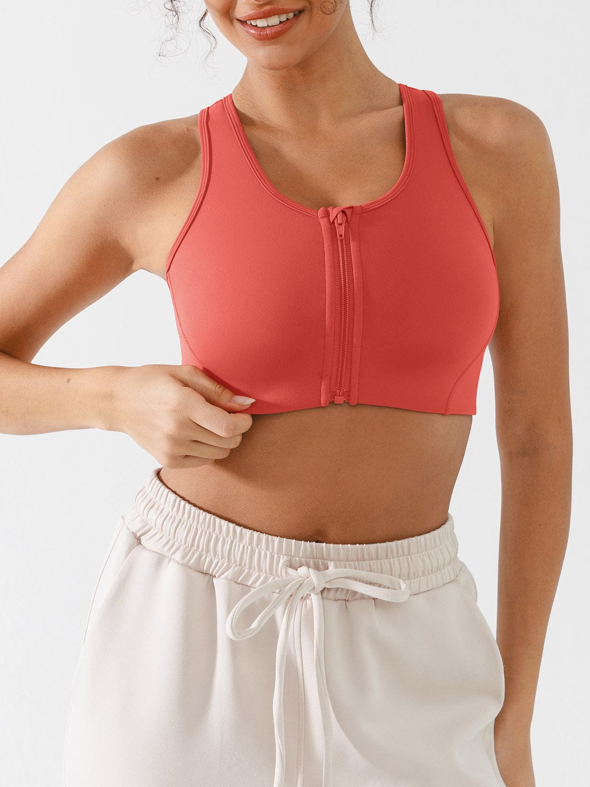 Vractive Mineral Red sculpting airflow zip sports bra front view