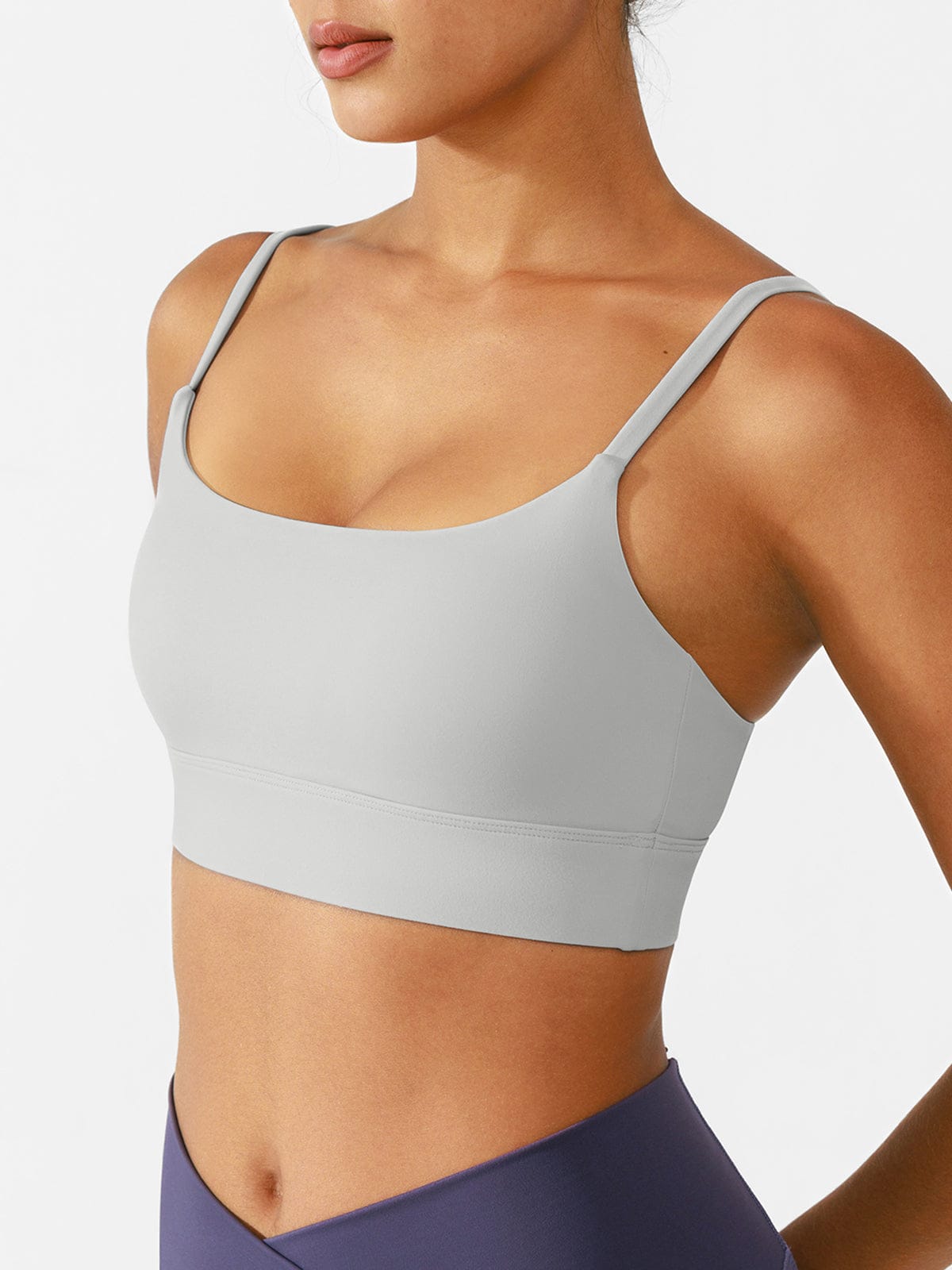 Model wearing Vractive Taupe Brown breathable sports bra side view