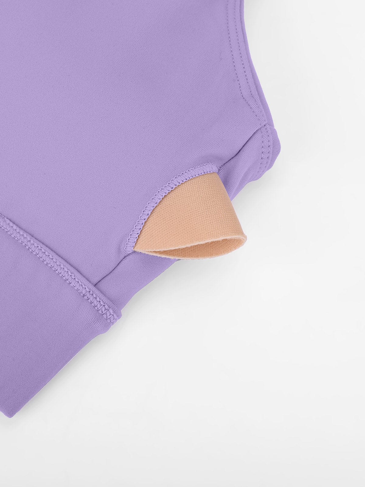 Close-up of Mallow Purple Vractive sports bra demonstrating removable cups for easy washing