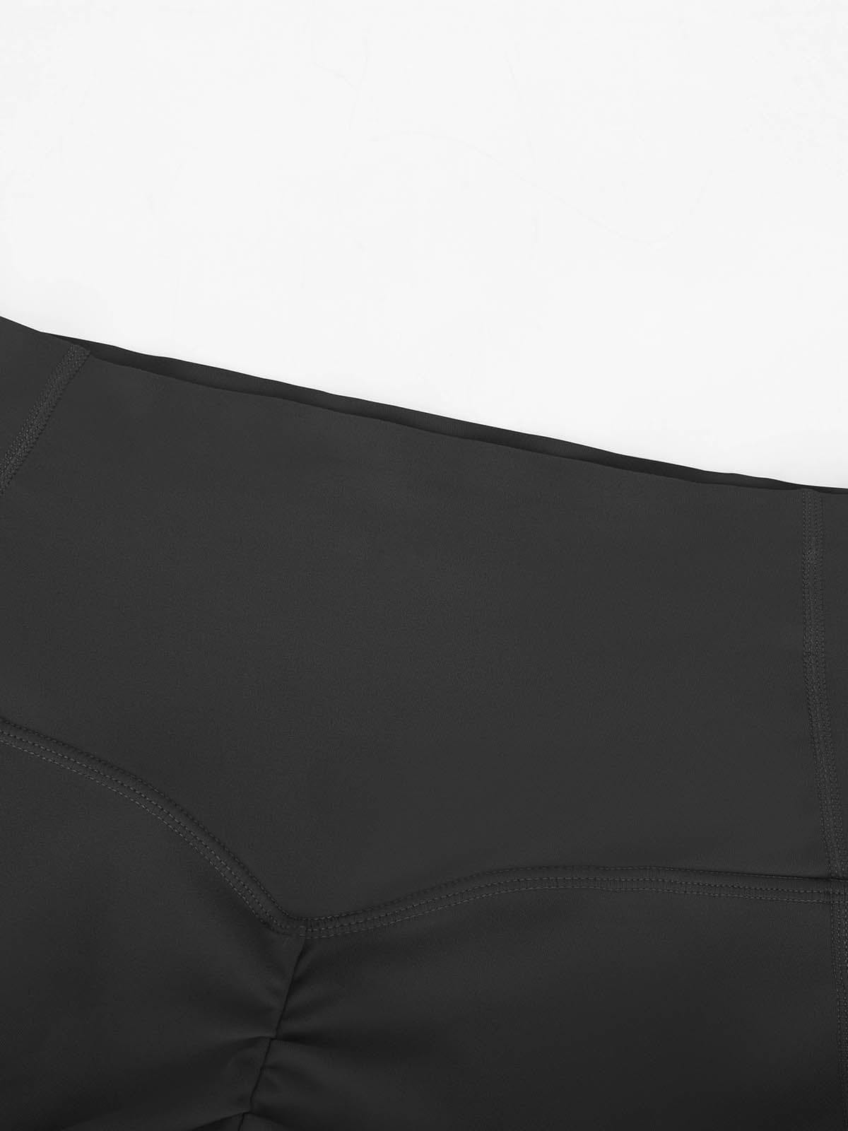 Macro view of the opaque, breathable high-stretch Black fabric on Vractive activewear