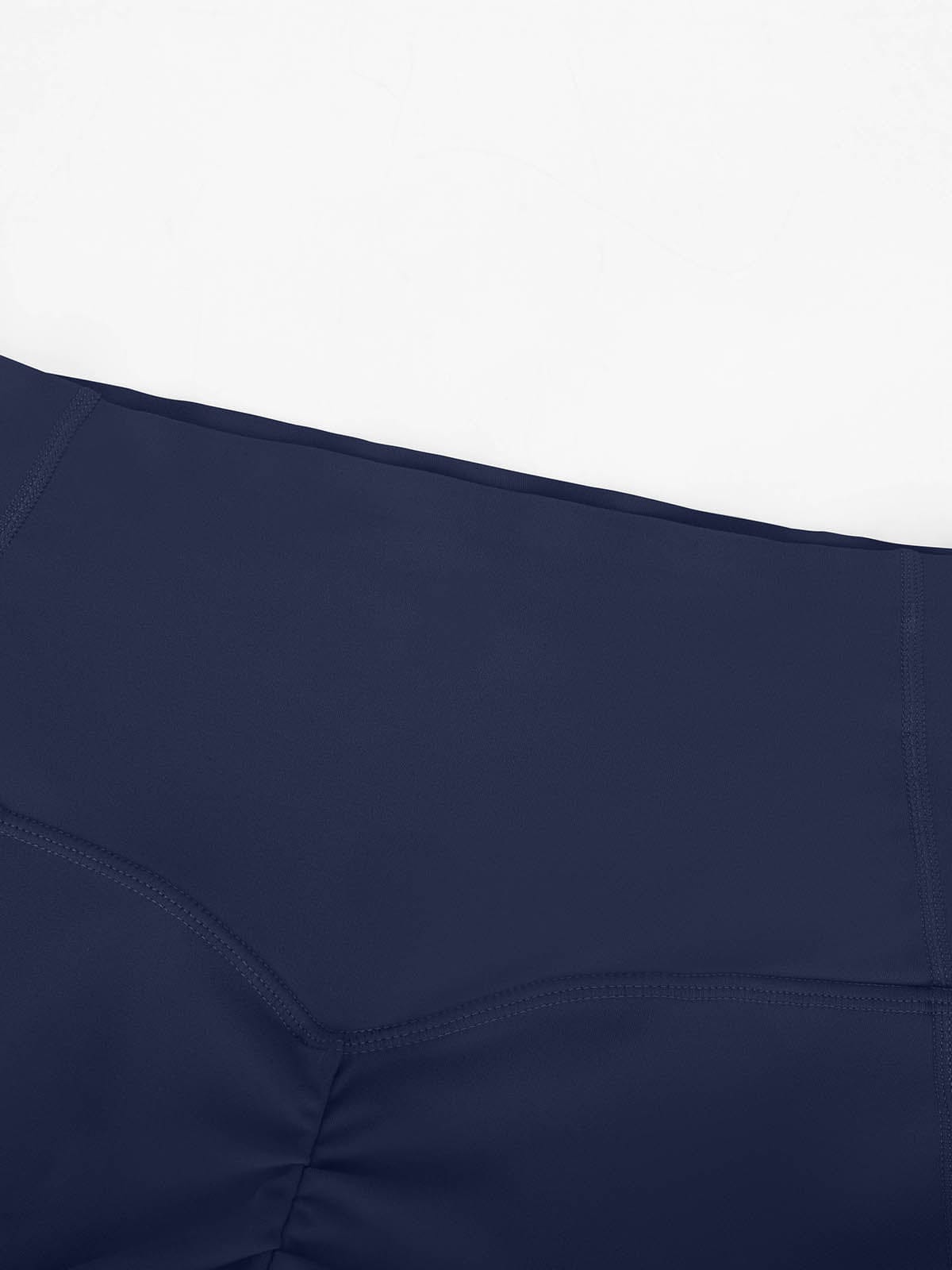 Close-up of the durable reinforced stitching on Navy Blue Vractive gym leggings