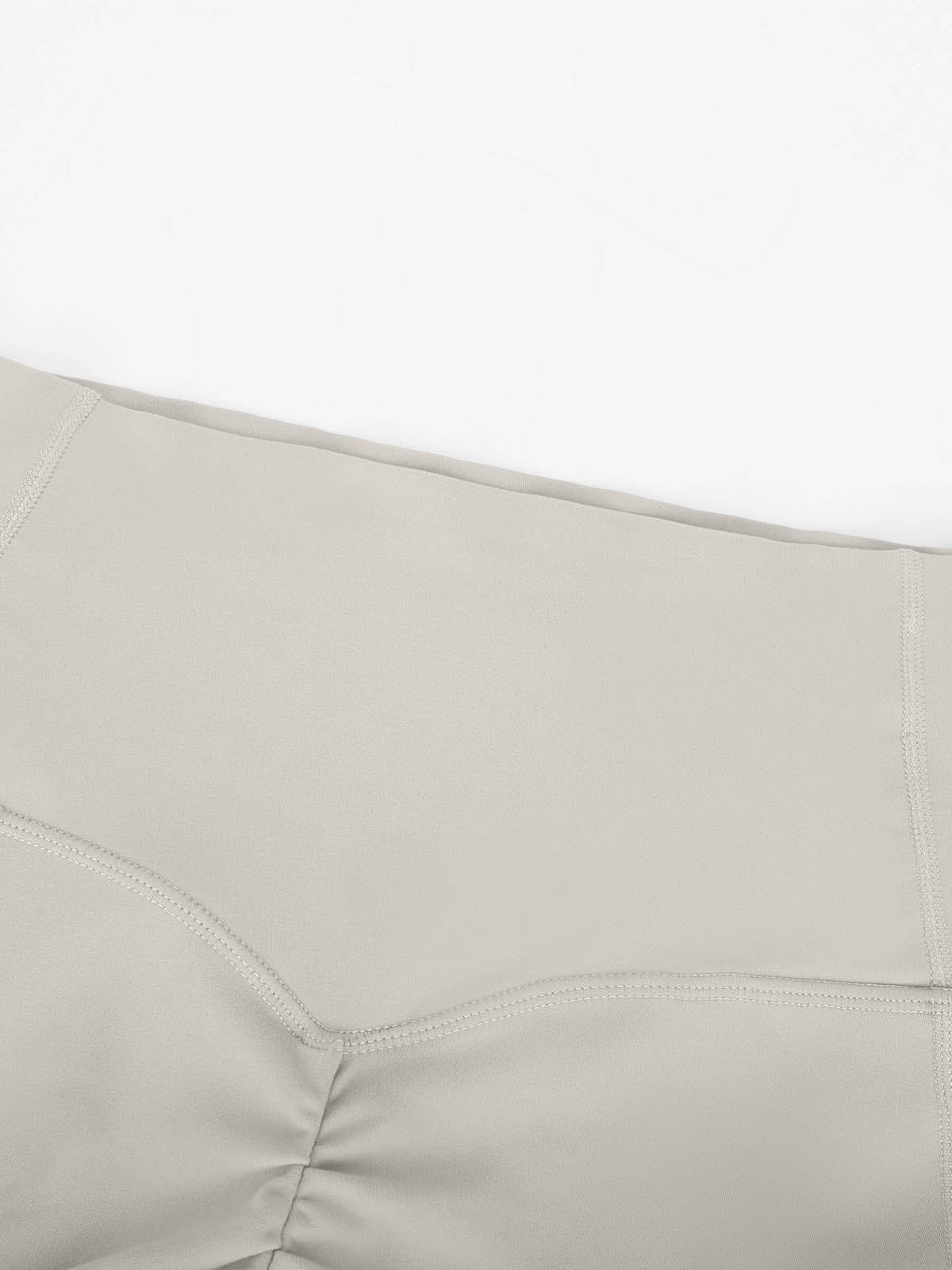 Detailed view of the smooth anti-chafe seams on Light Gray Vractive sports leggings