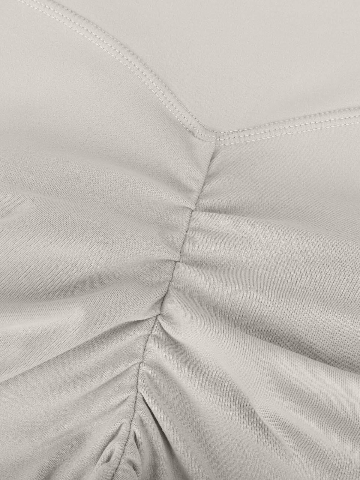 Close-up highlighting the peach lift contouring line on Light Gray Vractive leggings