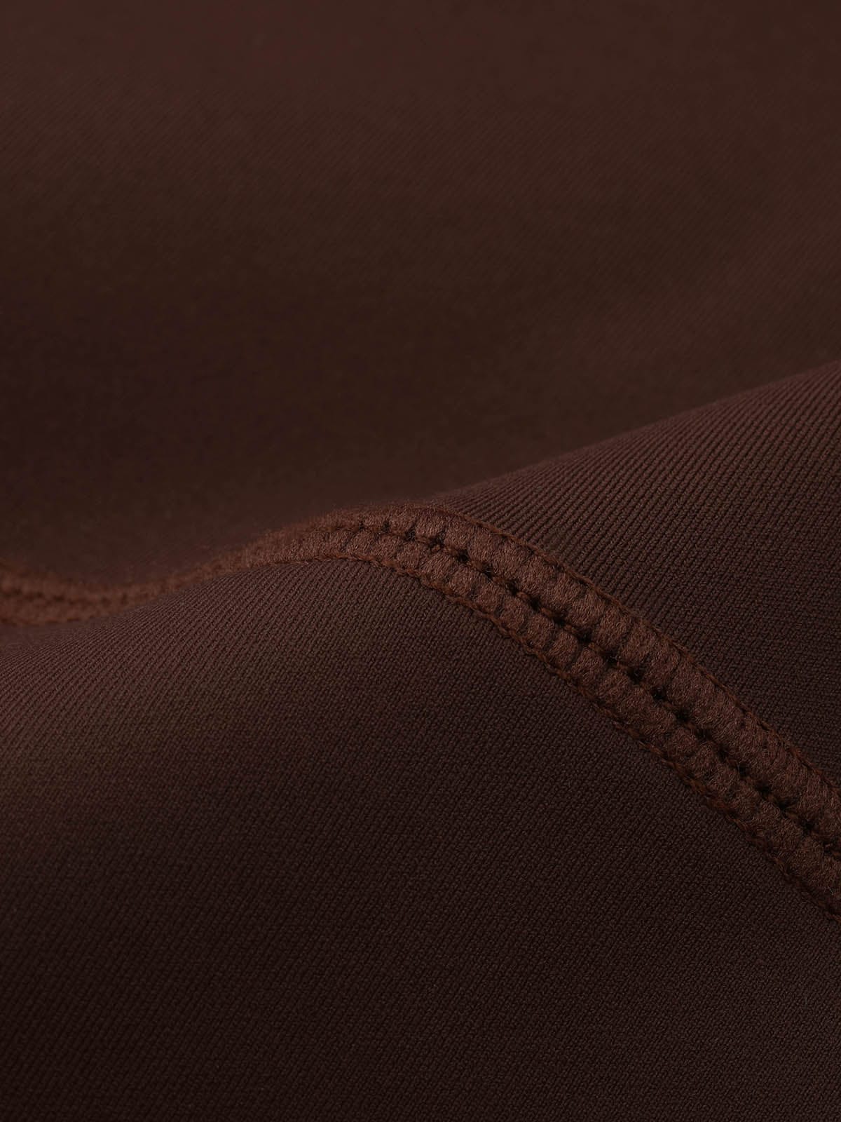 Close-up of the secure stretch stitching on Chocolate Brown Vractive fleece lined leggings