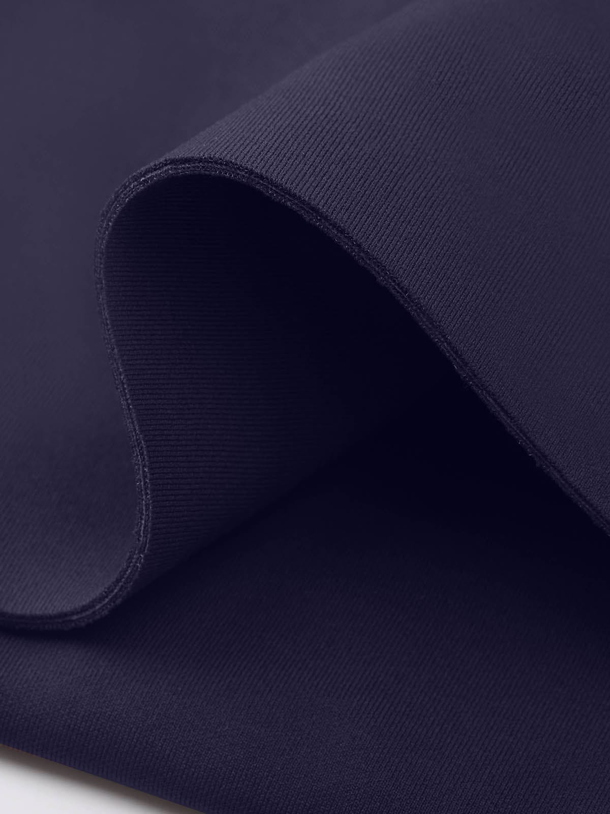 Close-up highlighting reinforced flatlock stitching on Navy Blue Vractive custom logo pants