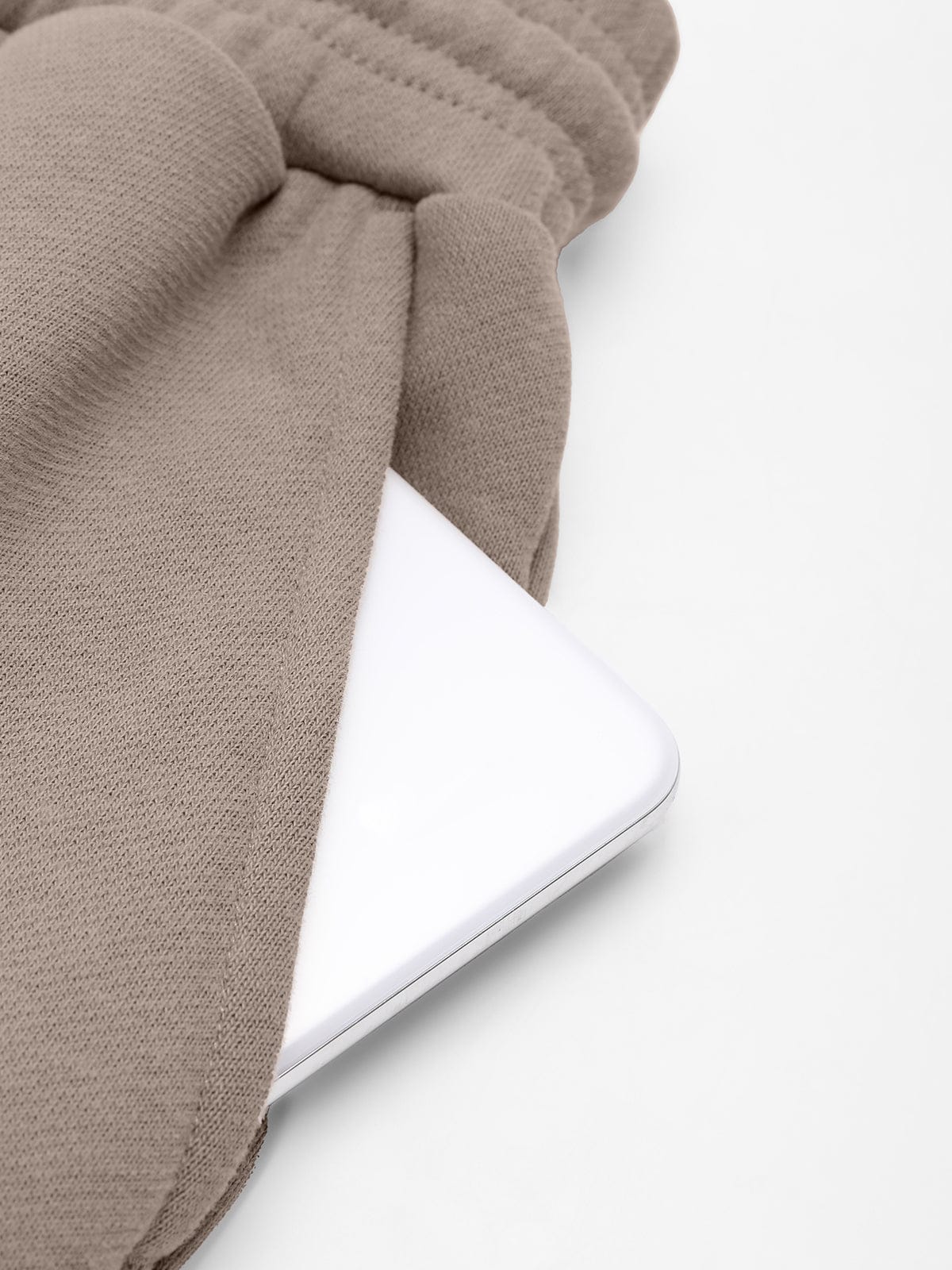 Close-up highlighting the secure slash pocket design on Light Khaki Vractive lounge sweatpants