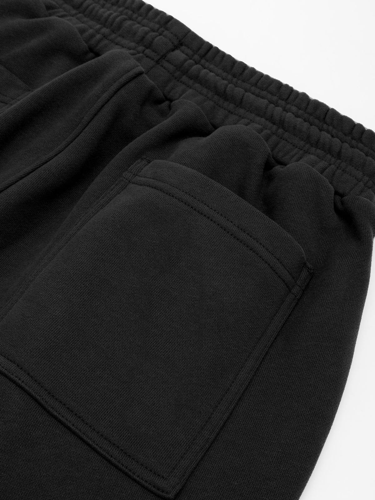 Detail view of the practical side storage pocket on Standard Black Vractive wide leg athleisure sweatpants