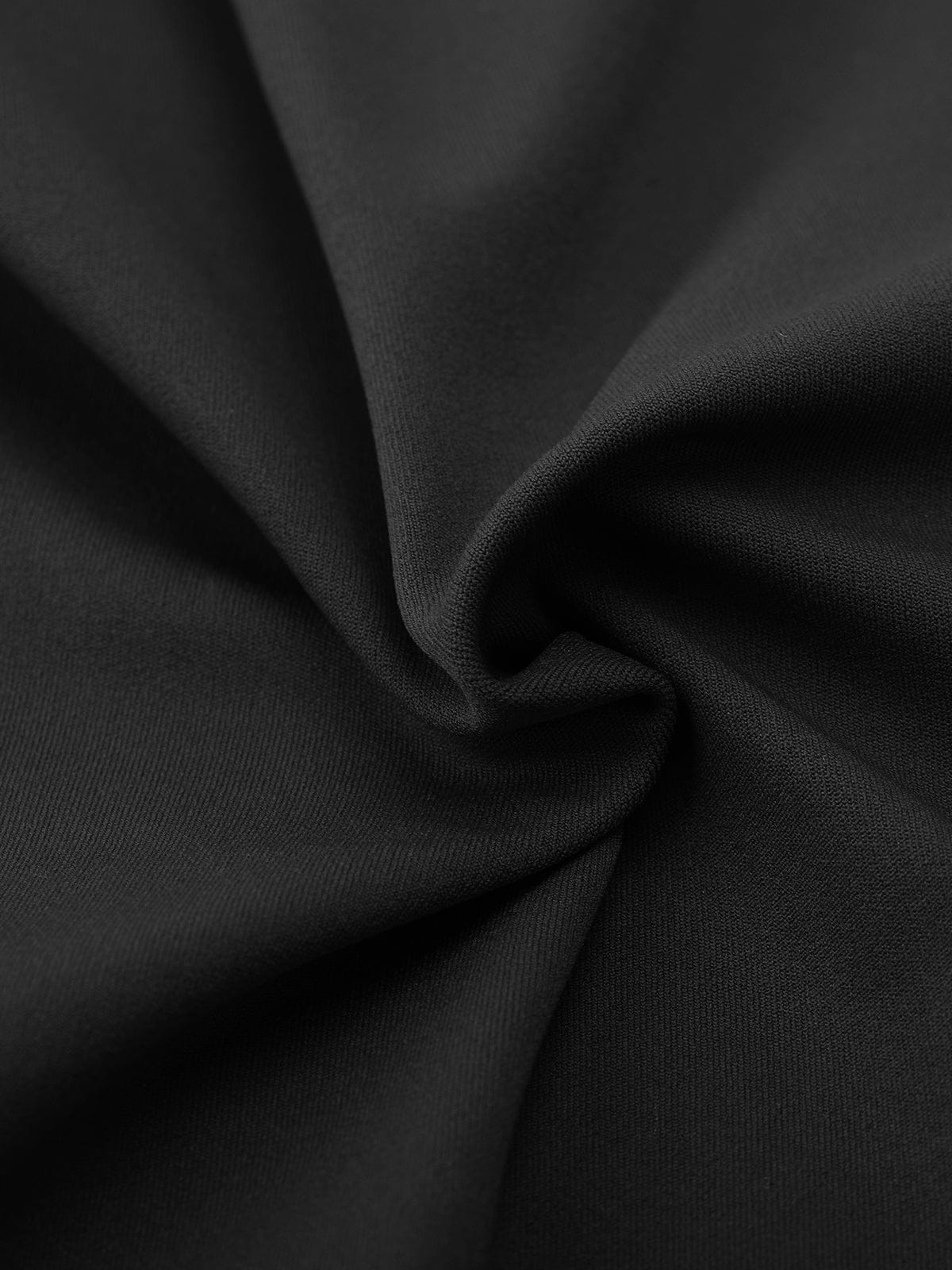 Detail shot of the opaque, high-density Standard Black nylon fabric on Vractive leggings