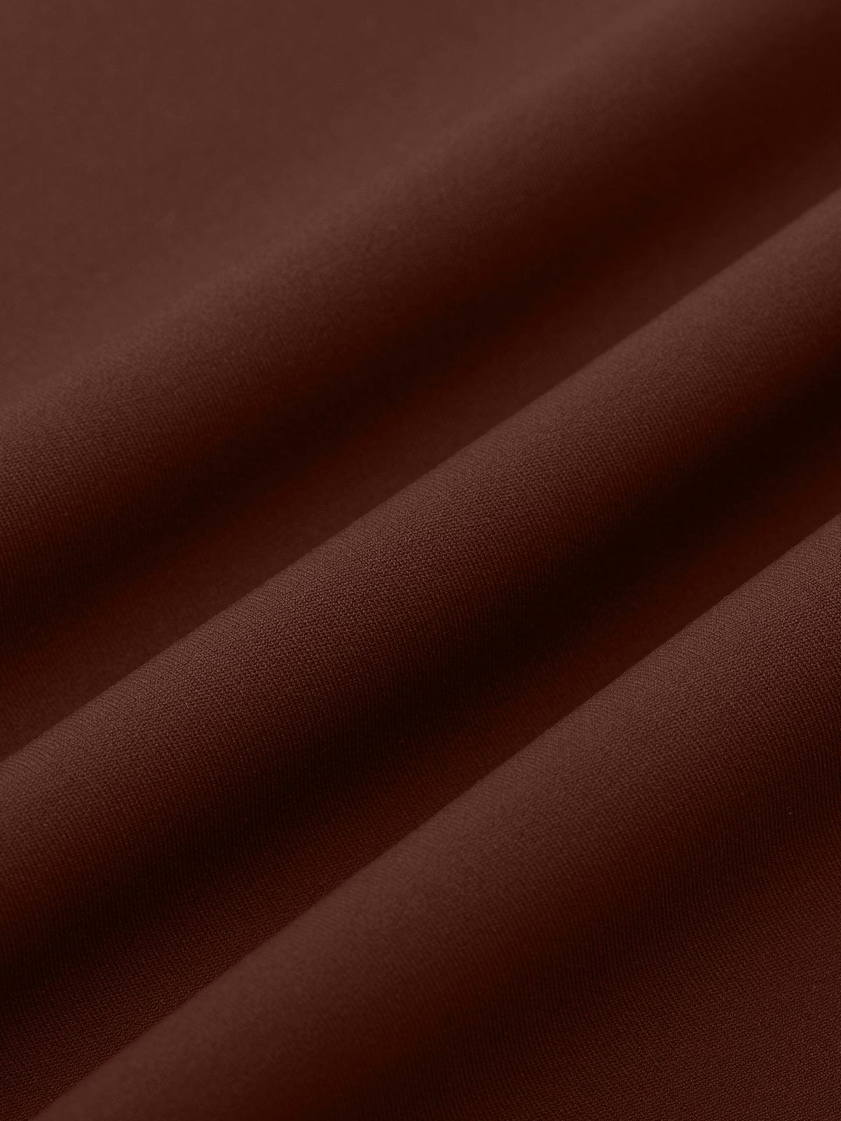 Close-up of the moisture-wicking Chocolate Brown nylon performance material on Vractive leggings