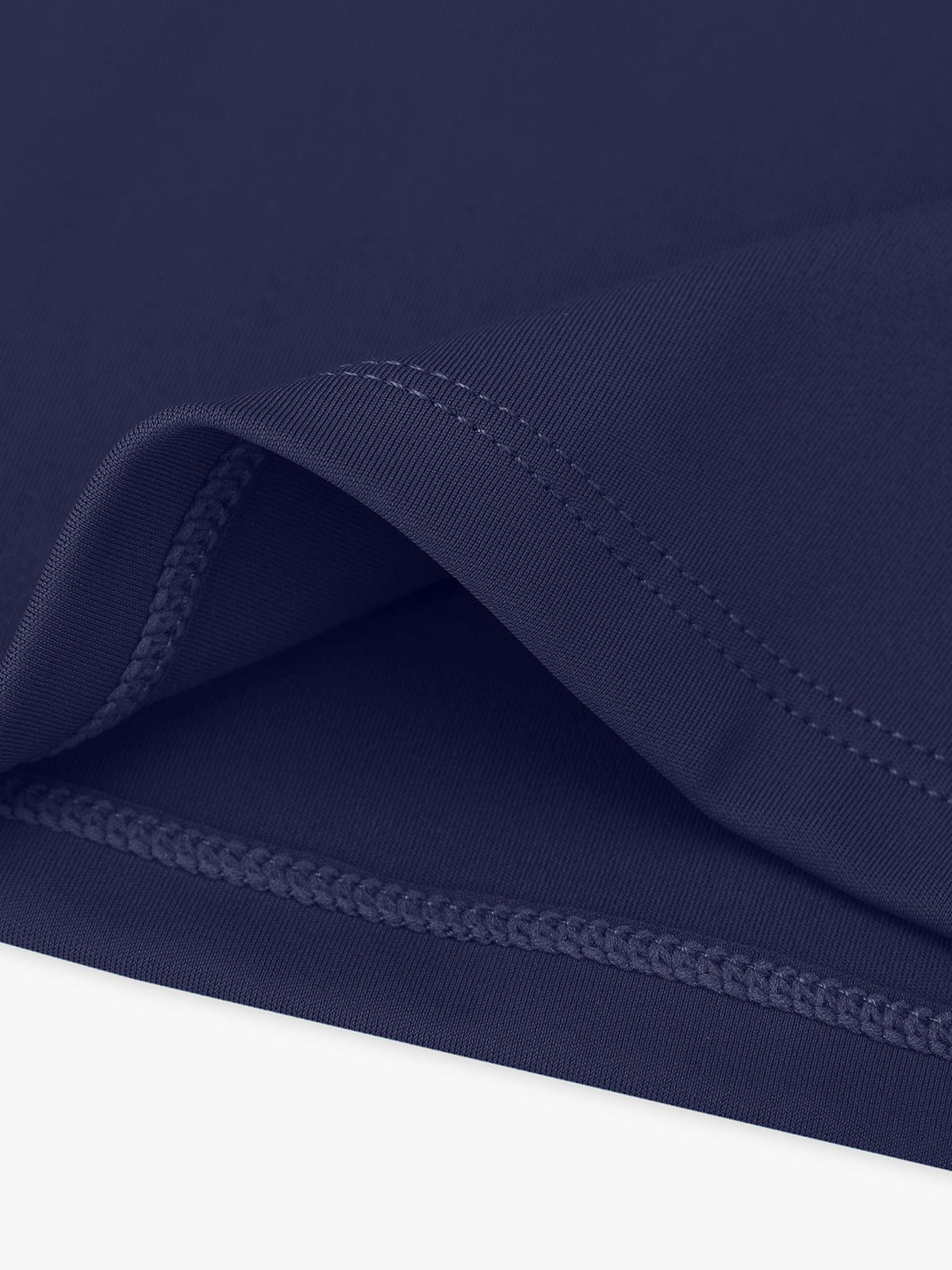 Macro view of reinforced flatlock stitching on Navy Blue Vractive flared leggings