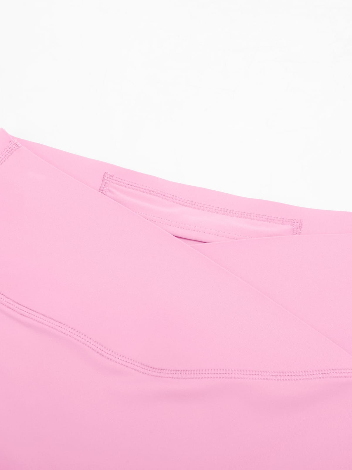 Pink cross waist flare leggings waistband detail