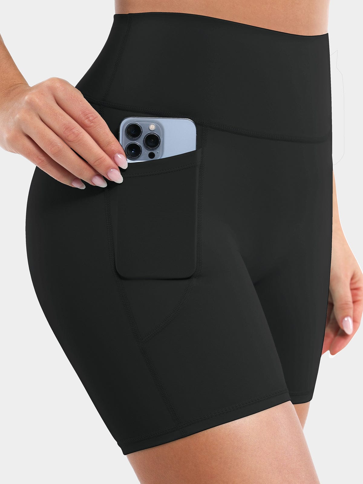 Side profile of Vractive Standard Black activewear shorts highlighting deep side pockets