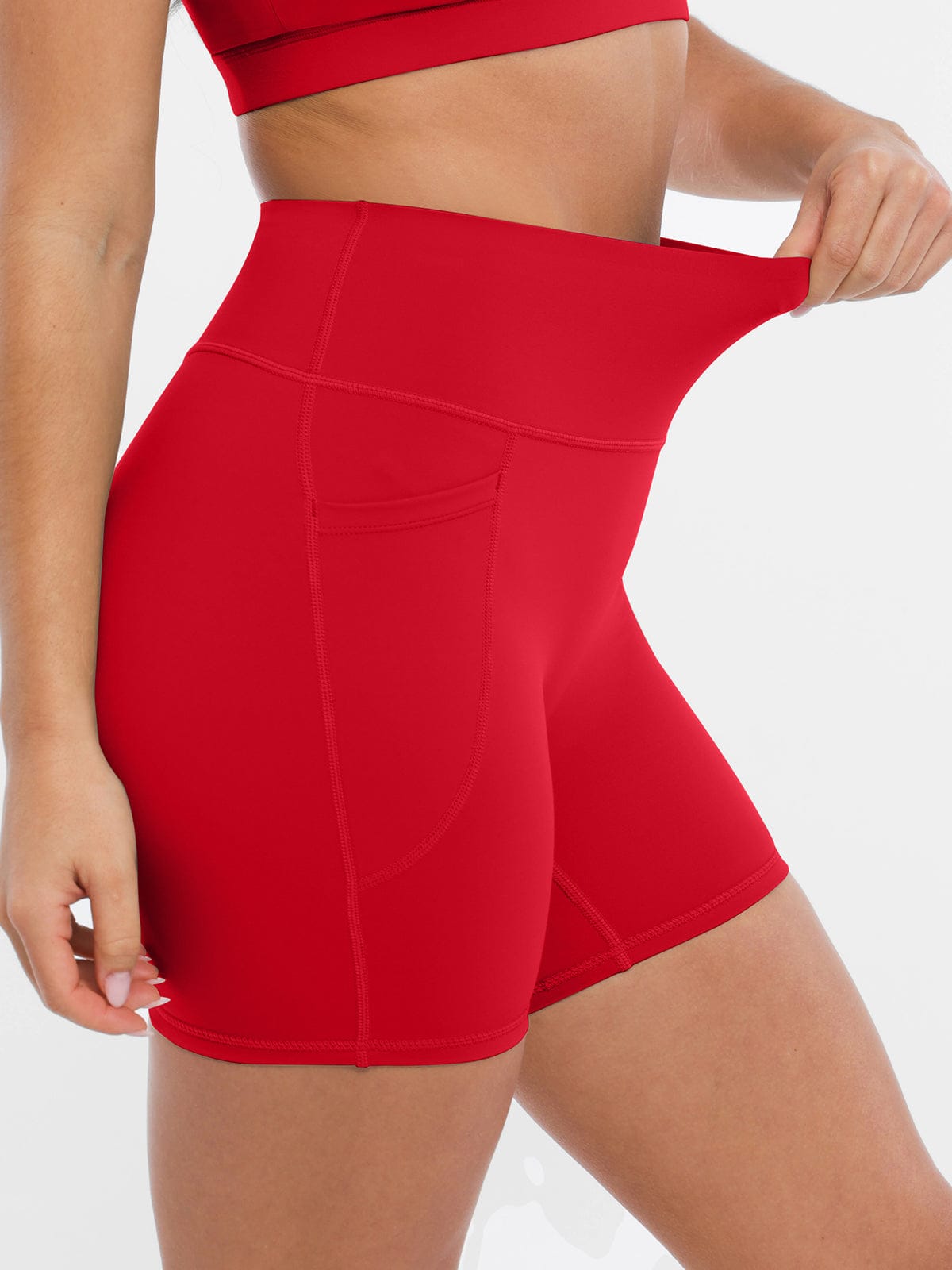 Close-up of four-way stretch breathable fabric on Chili Red Vractive gym shorts