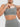 Neutral Gray lightweight sports bra by Vractive showing the removable cups feature for easy cleaning and customized padding.