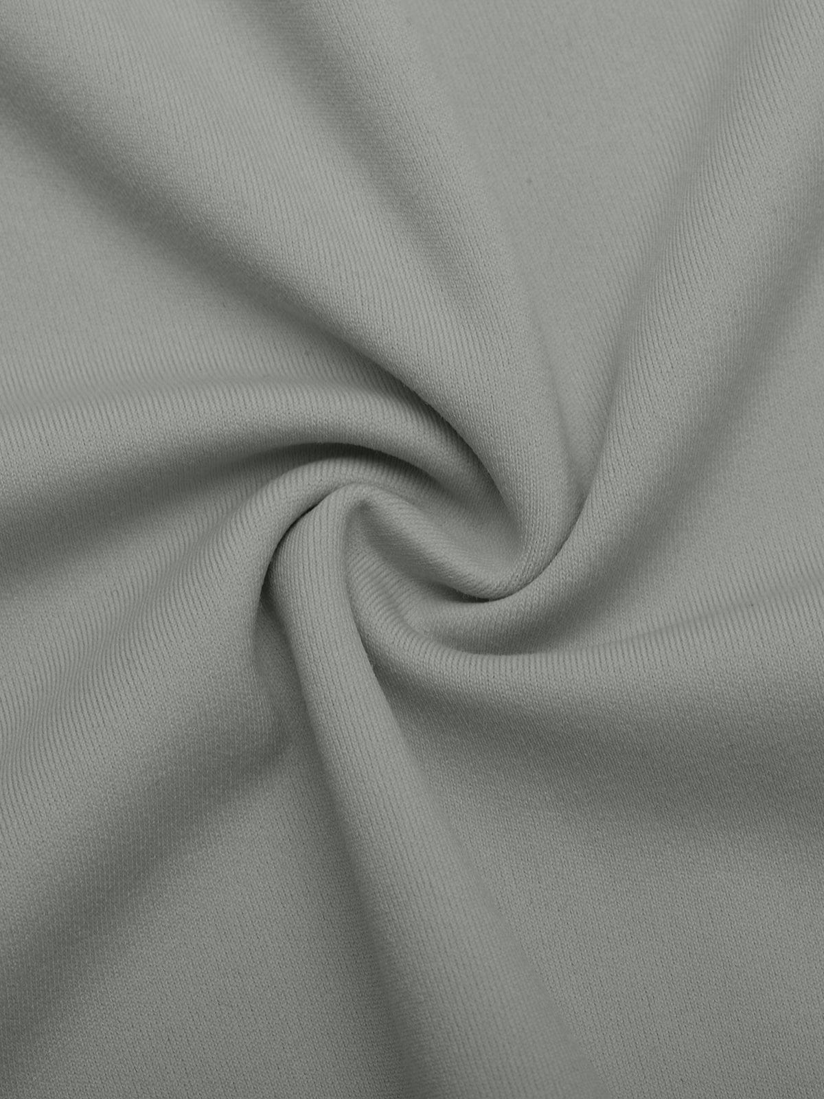 Close-up of removable cups and breathable grey fabric on Vractive sports bra