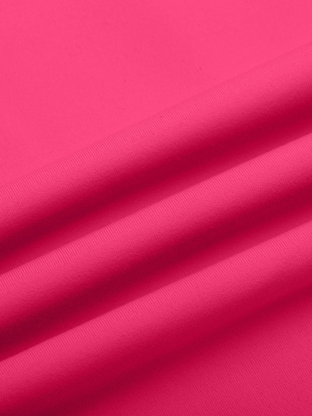 Close-up detailing the breathable Raspberry Red material of Vractive sports bra