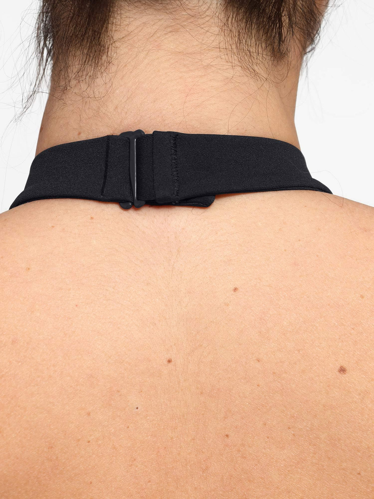 Halter neck closure detail of black Vractive shapewear jumpsuit, one piece activewear

