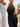Black Vractive one piece halter jumpsuit in active pose, thigh slimming shapewear
