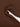Seamless fabric detail of brown Vractive one piece halter jumpsuit, thigh slimming shapewear
