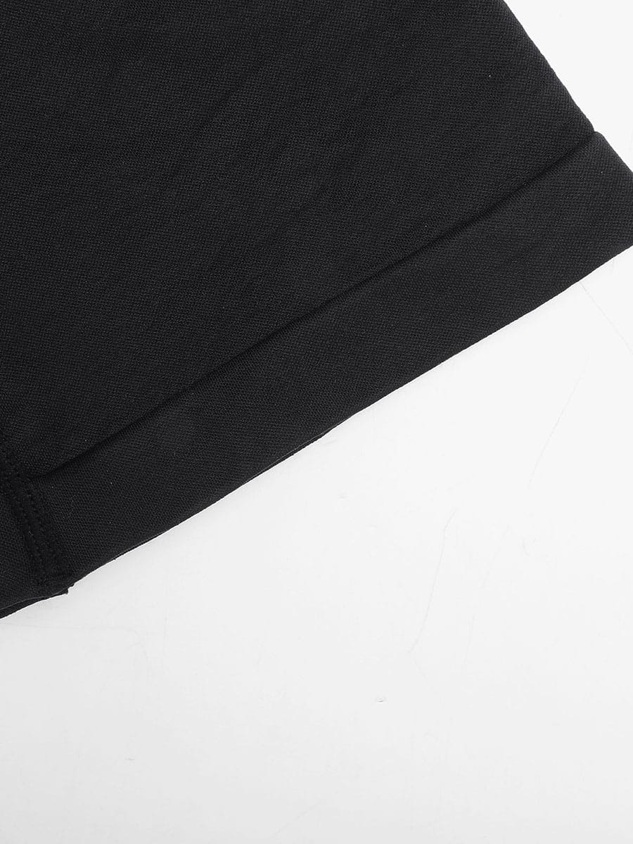 black-shaping-romper-flat-lay-hemline