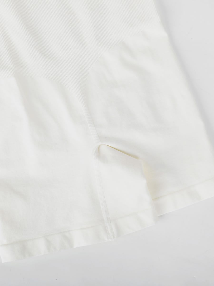 white-shaping-romper-flat-lay-butt-lift