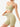 Side view of light green Vractive seamless sports bra, wash ribbed fabric with heart neckline