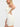 Side view of white Vractive seamless square neck sport romper, one piece activewear
